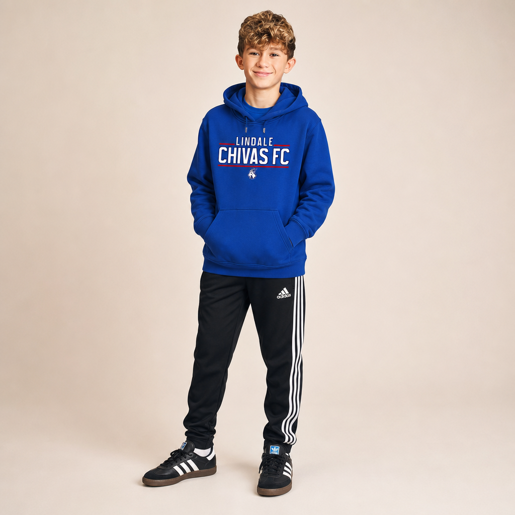 Boy wearing the Lindale Chivas Youth Soccer Hoodie in True Royal with Adidas soccer pants and Sambas