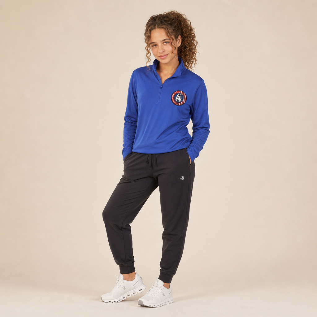 Girl wearing the Lindale Chivas Quarter-Zip Pullover in Tour Blue with joggers and white running shoes