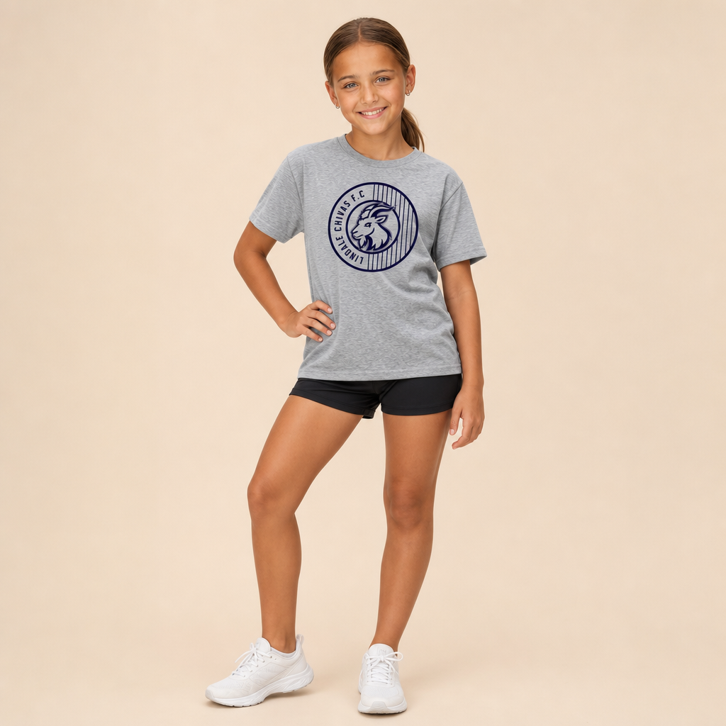 Girl wearing the Lindale Chivas Logo Youth Tee in Dark Heather Gray with athletic shorts and white running shoes