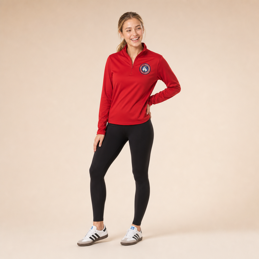 Woman wearing the Lindale Chivas Quarter-Zip Pullover in Red with leggings and Adidas Sambas