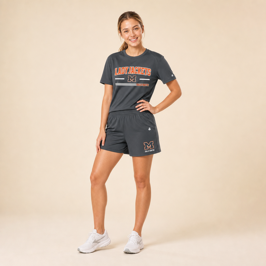 Athlete wearing Mineola Lady Jackets high school girls athletics kit — tee and shorts