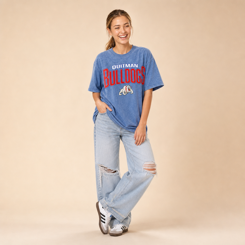Quitman Bulldogs Snow Washed Tee in light blue — Quitman Bulldogs lockup and bulldog mascot in red, white and blue, worn by a model