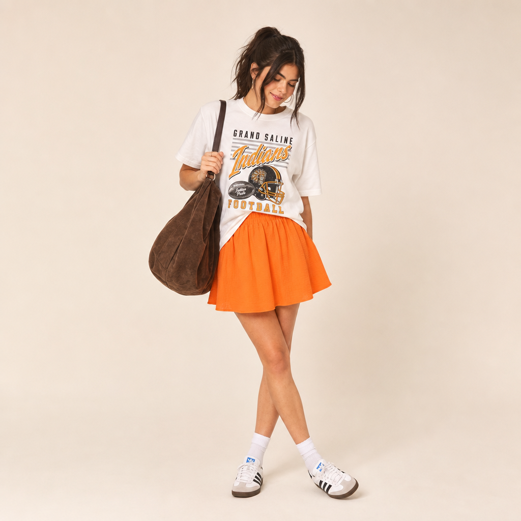 Grand Saline Indians Football Retro Tee — vintage helmet and Indians script graphic, worn by a model