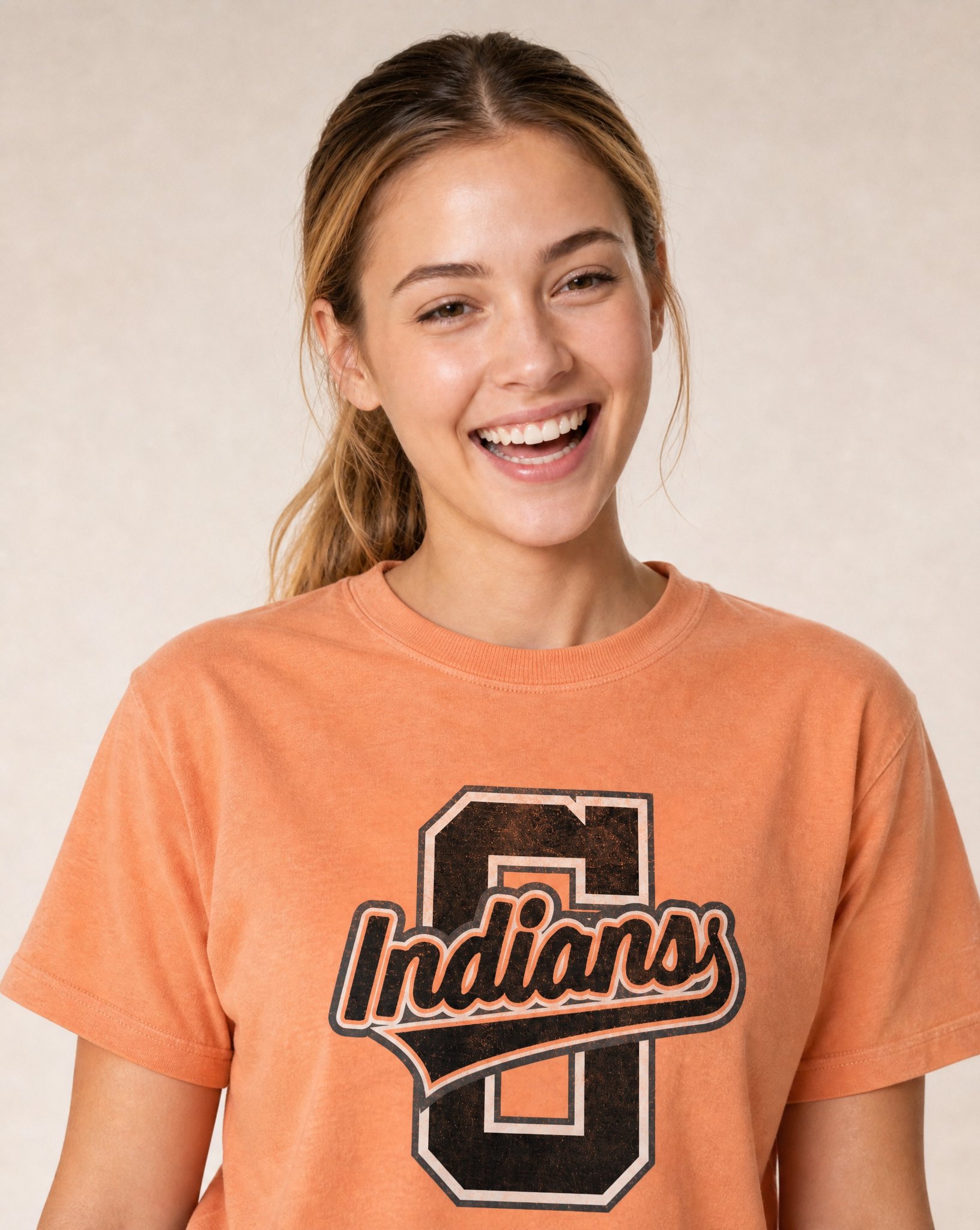Close-up of the Grand Saline Indians varsity print in Burnt Orange