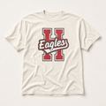 Harmony Eagles Varsity Spirit Tee in Ivory, Comfort Colors C1717 flat lay