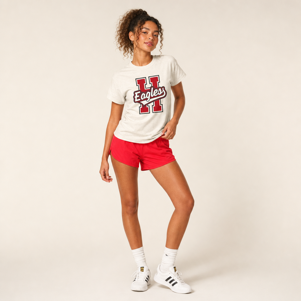 Model wearing the Harmony Eagles Varsity Spirit Tee in Ivory by Dane Apparel
