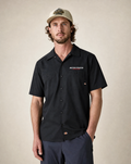 Vanguard Autotech text logo Dickies shop shirt in black on male model, front view
