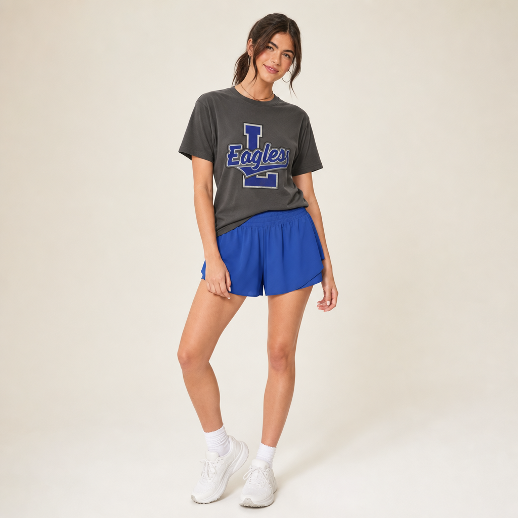 Model wearing the Lindale Eagles Varsity Spirit Tee in Pepper by Dane Apparel