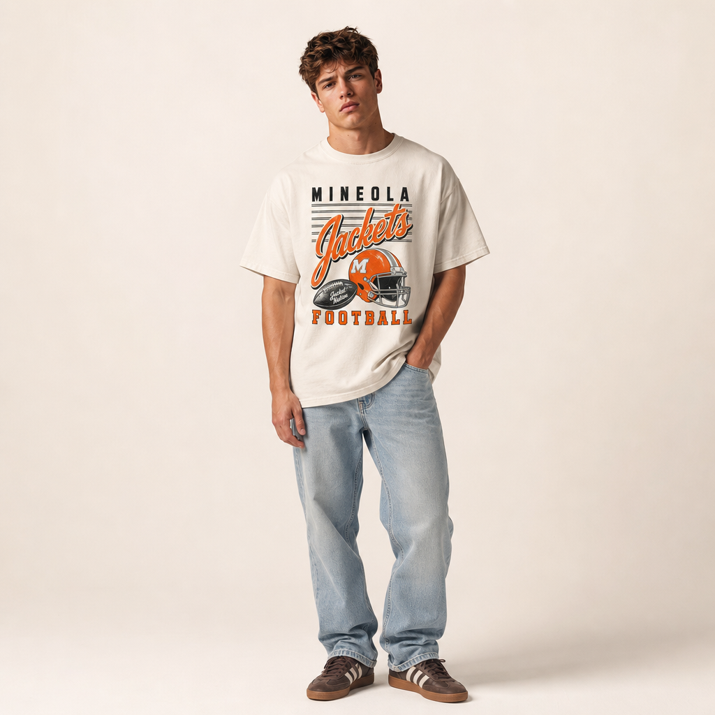 Mineola Jackets Football Retro Tee worn untucked with jeans