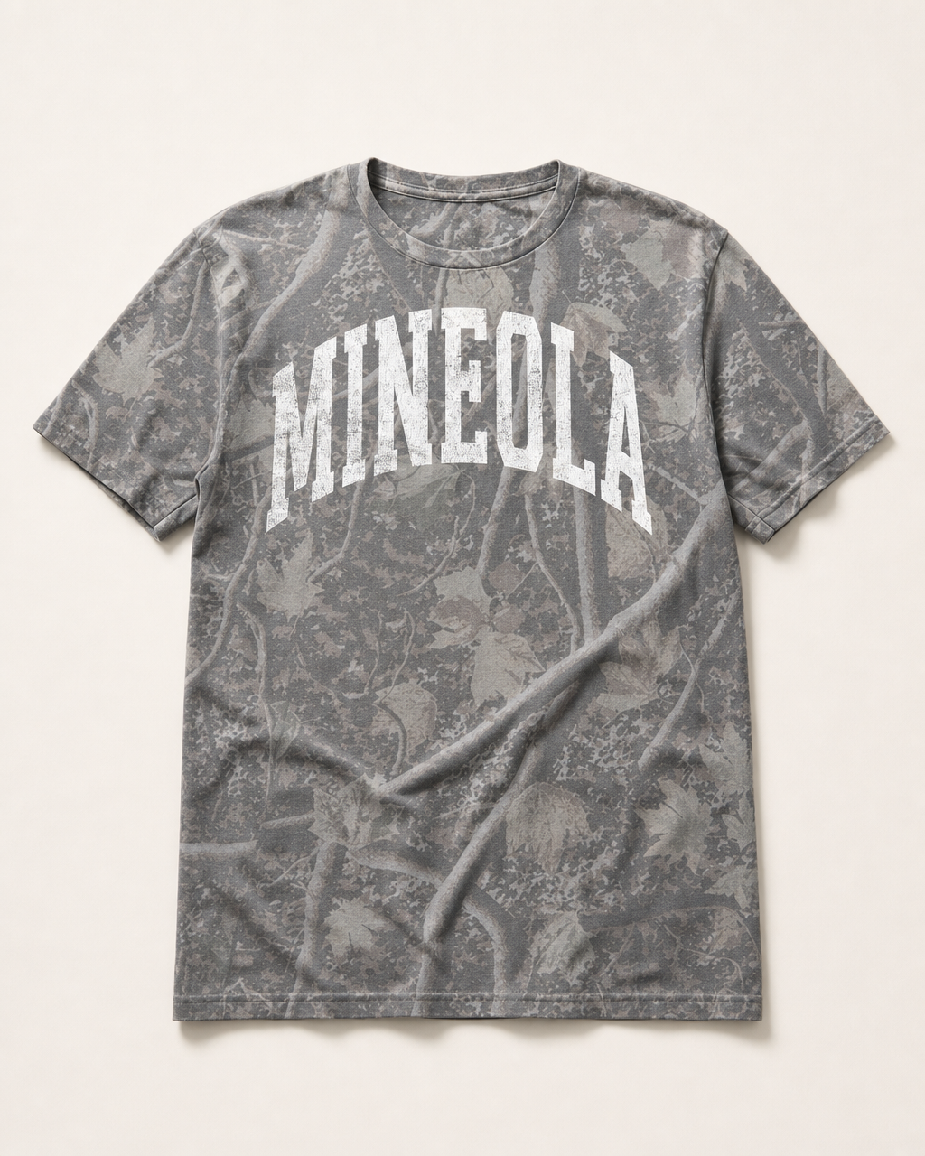 Mineola Premium Camo Tee flat lay on Deadwood Tree Camo