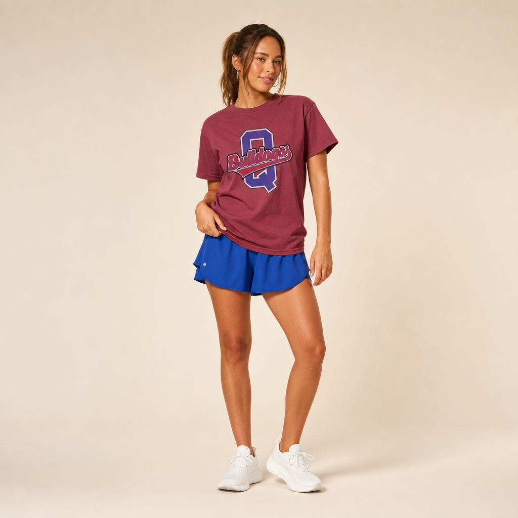 Model wearing the Quitman Bulldogs Varsity Spirit Tee in Crimson by Dane Apparel