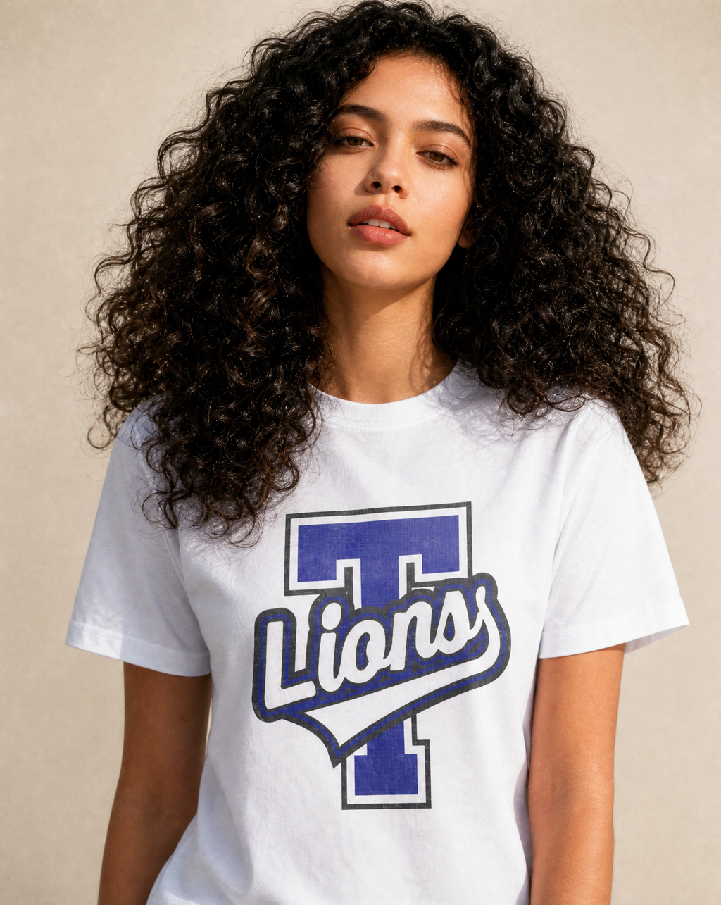 Close-up of the Tyler High Lions varsity print in White