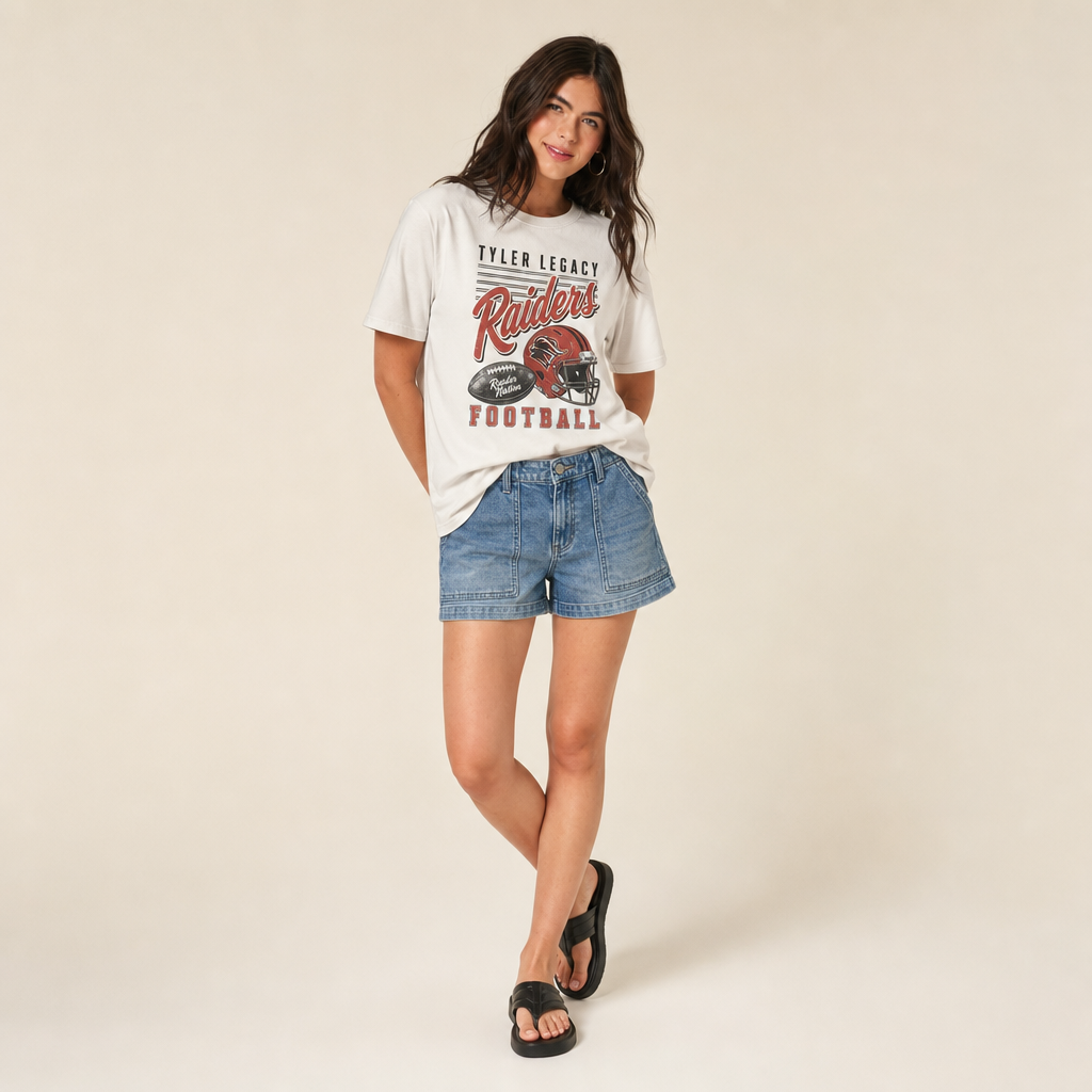 Tyler Legacy Raiders Football Retro Tee — vintage helmet and Raiders script graphic in red, worn by a model