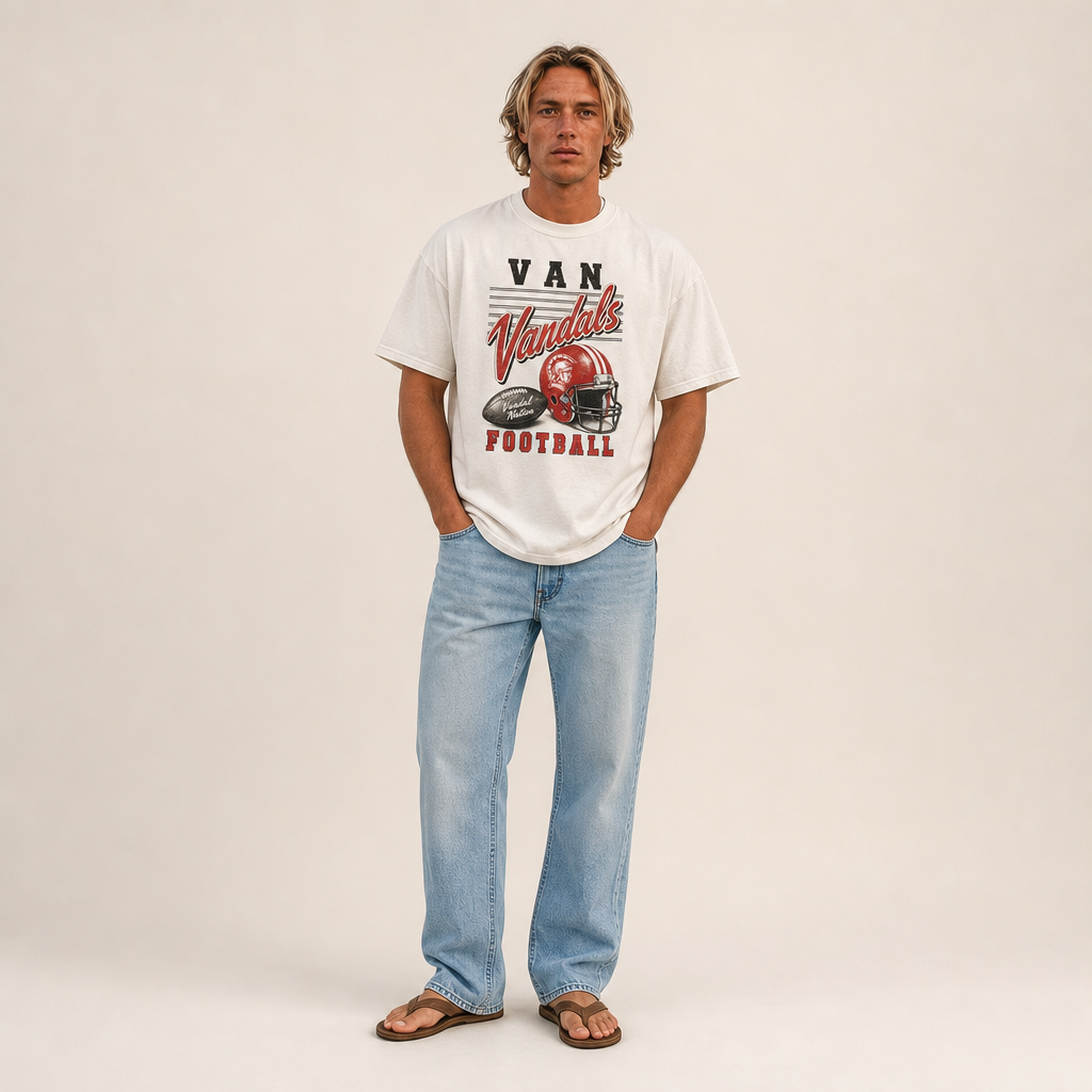 Van Vandals Football Retro Tee worn untucked with jeans