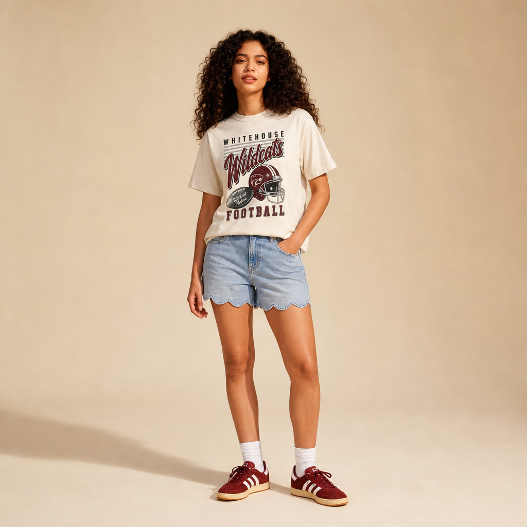 Whitehouse Wildcats Football Retro Tee — vintage helmet and Wildcats script graphic in maroon, worn by a model